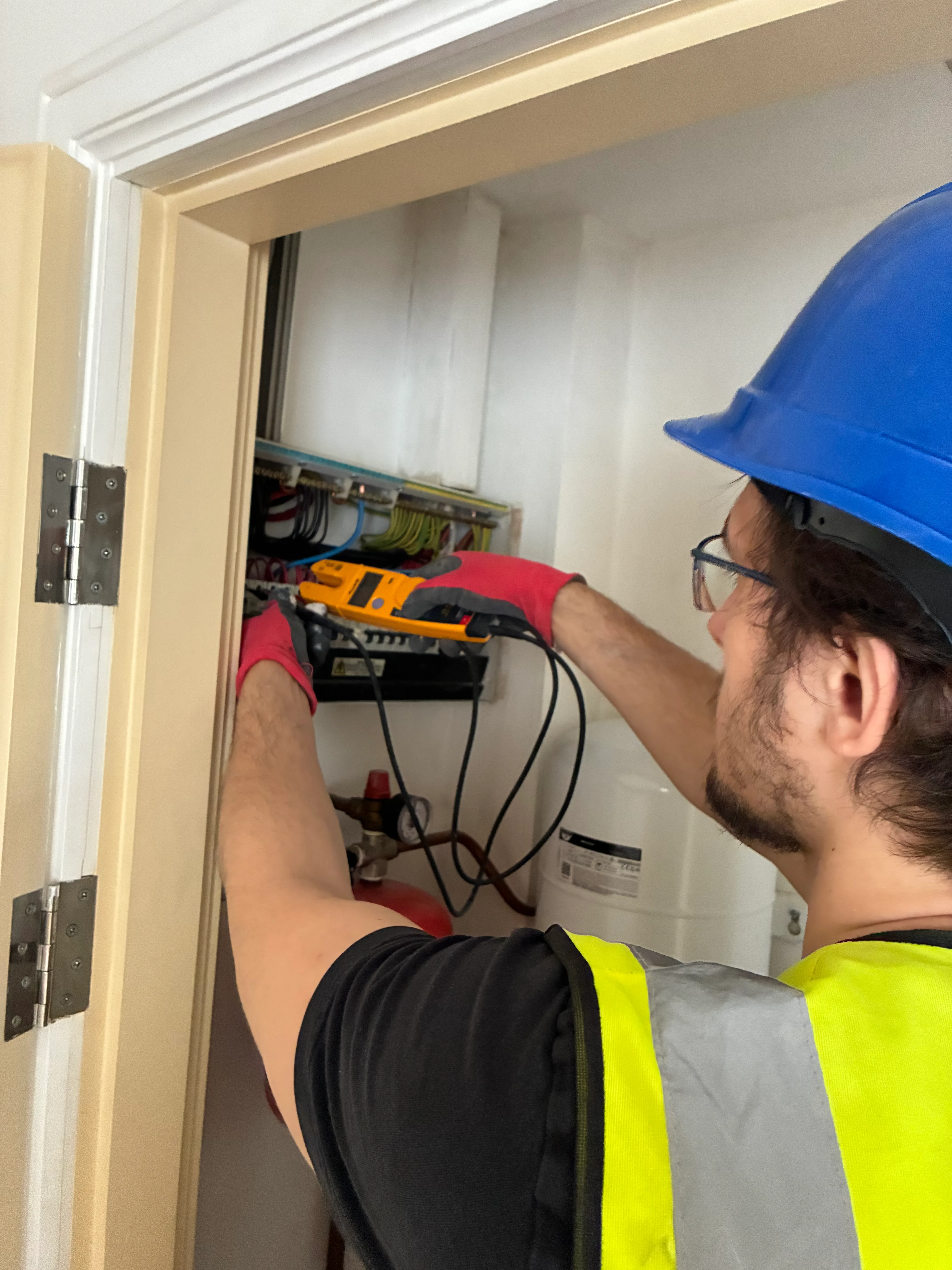 Eugeniu Galbura of EugEnergy on an electrical job